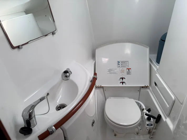 Southern Cross Yacht Photos Pics Bathroom of 2003 Beneteau Oceanis 42CC yacht with sink and marine toilet.