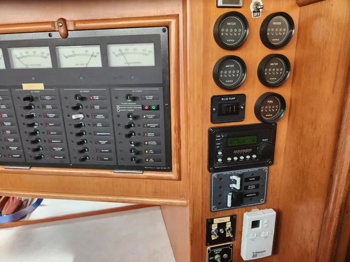 Lea Scotia Yacht Photos Pics Control panel of a 1989 Taswell 43 yacht, featuring gauges and switches.
