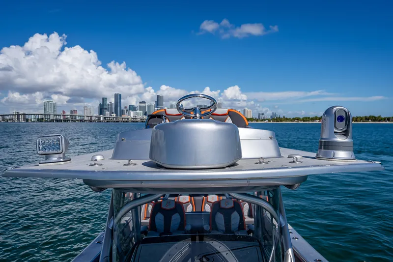  Yacht Photos Pics 2012 Yellowfin 39 boat on water with city skyline in background.