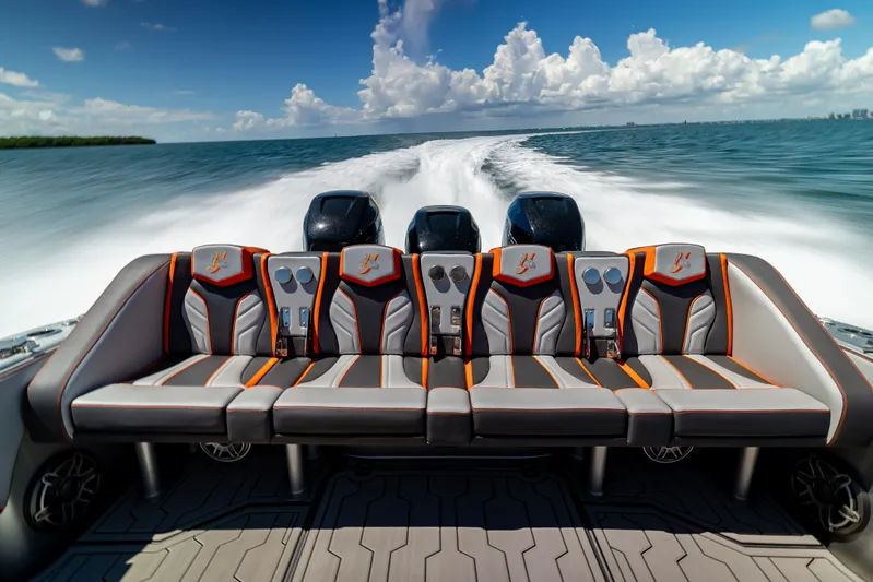  Yacht Photos Pics 2012 Yellowfin 39 boat with stylish seating, cruising on open water under a clear sky.