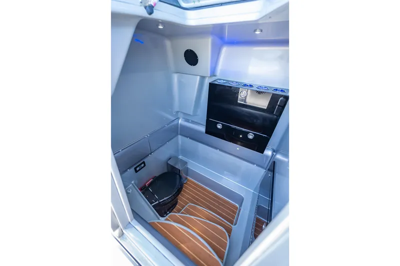  Yacht Photos Pics 2012 Yellowfin 39 interior cabin with modern amenities and wooden flooring.