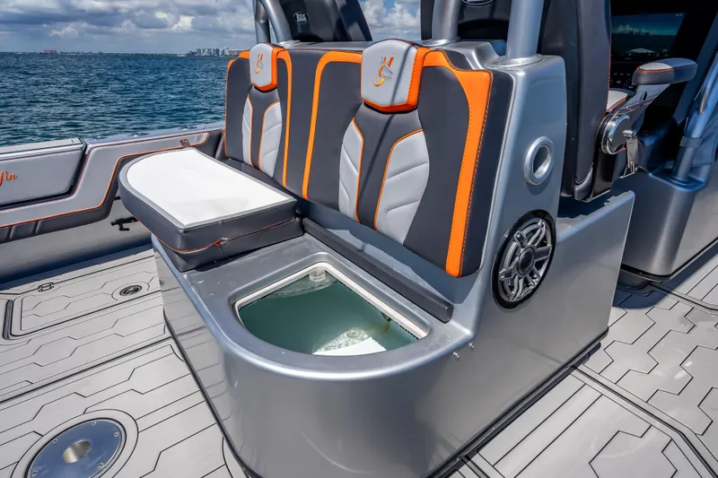  Yacht Photos Pics 2012 Yellowfin 39 boat interior with stylish seating and open storage compartment.