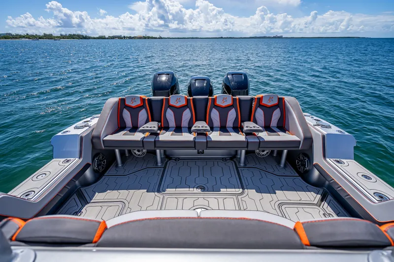  Yacht Photos Pics 2012 Yellowfin 39 boat with stylish seating and powerful engines on open water.