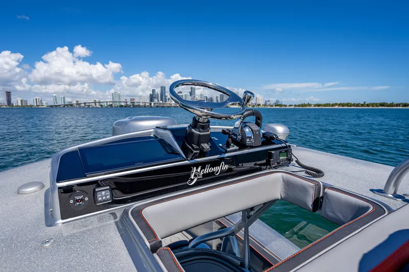  Yacht Photos Pics 2012 Yellowfin 39 boat dashboard with city skyline in the background.