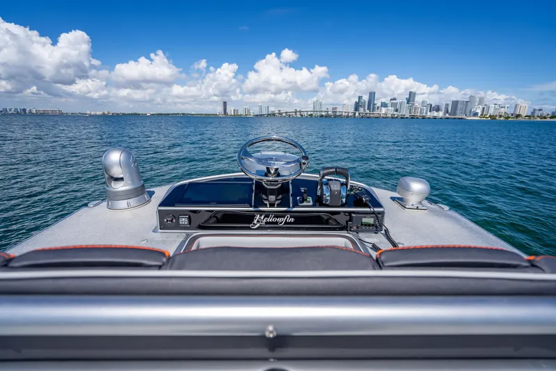  Yacht Photos Pics 2012 Yellowfin 39 boat dashboard with city skyline in the background.