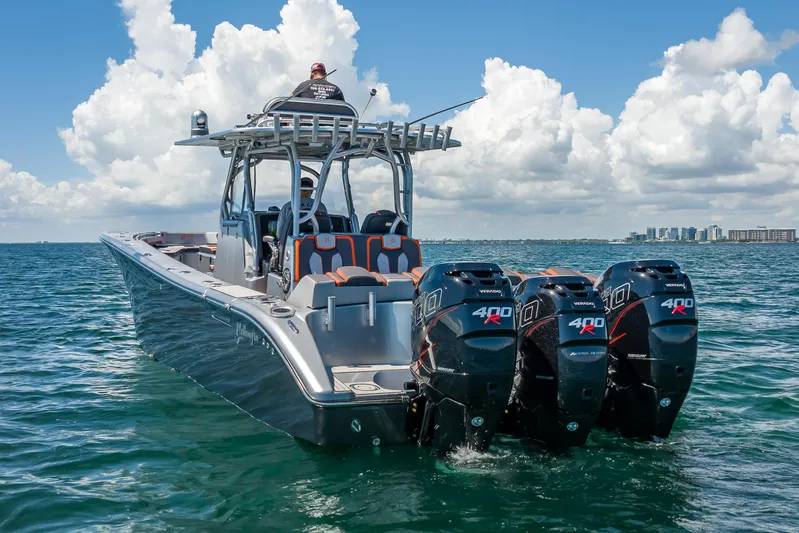  Yacht Photos Pics 2012 Yellowfin 39 boat with triple 400R outboard engines on open water.