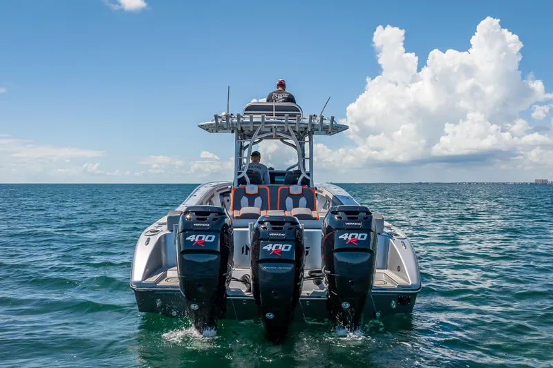  Yacht Photos Pics 2012 Yellowfin 39 boat with triple 400R engines cruising on open water.