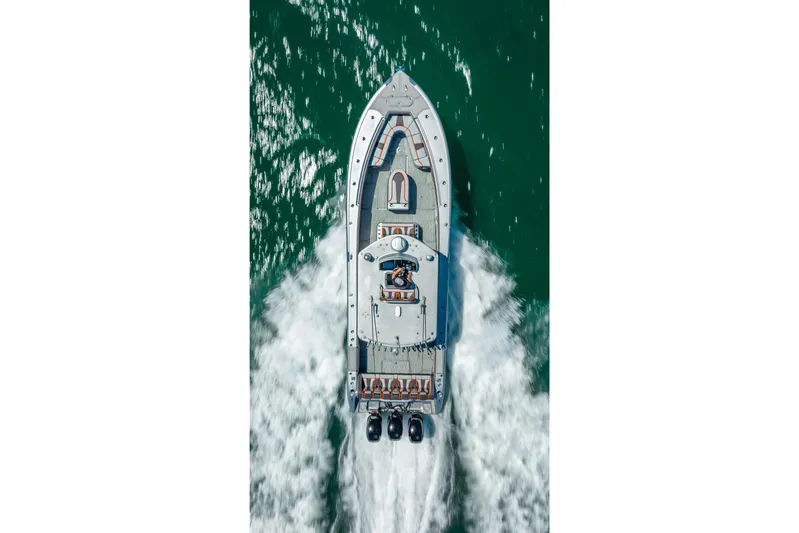  Yacht Photos Pics Overhead view of a 2012 Yellowfin 39 boat cruising on the water.