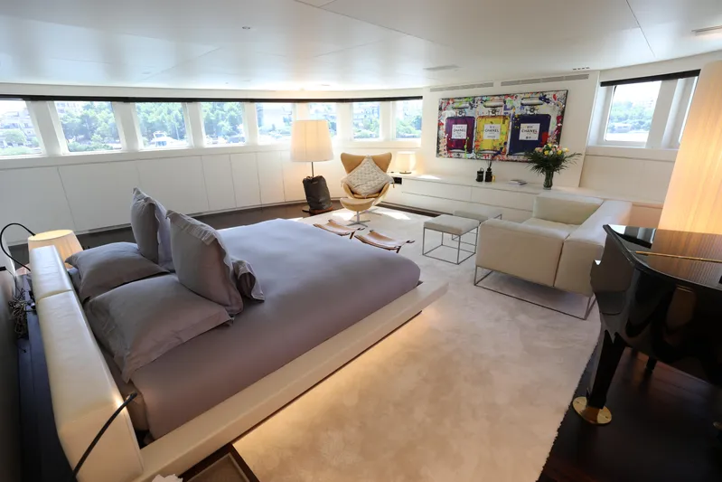 Tribu Yacht Photos Pics Luxurious Mondomarine Explorer 2007 yacht interior with elegant bedroom and modern decor.