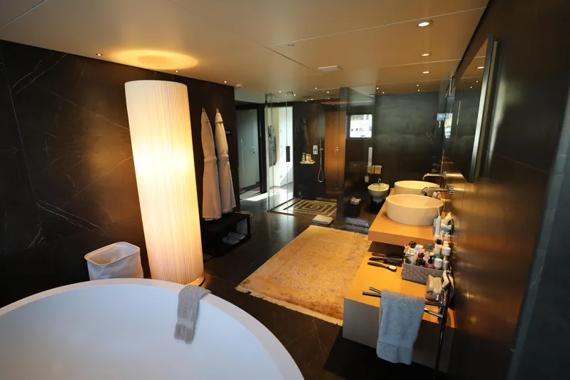 Tribu Yacht Photos Pics Luxurious Mondomarine Explorer 2007 yacht bathroom with modern fixtures and elegant design.