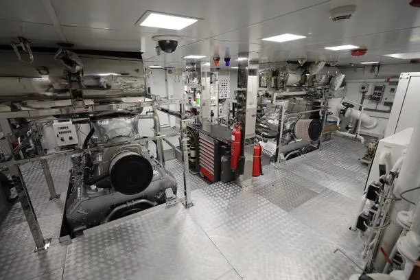 Tribu Yacht Photos Pics Engine room of 2007 Mondomarine Explorer yacht, featuring advanced machinery and equipment.