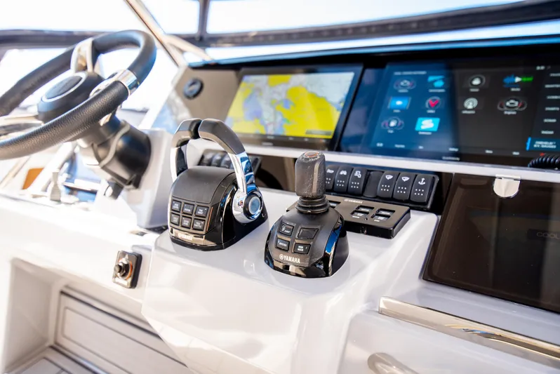 Nauti Brigi Gull Yacht Photos Pics 2021 Jeanneau Leader 12.5 WA helm with advanced navigation controls and touchscreen displays.