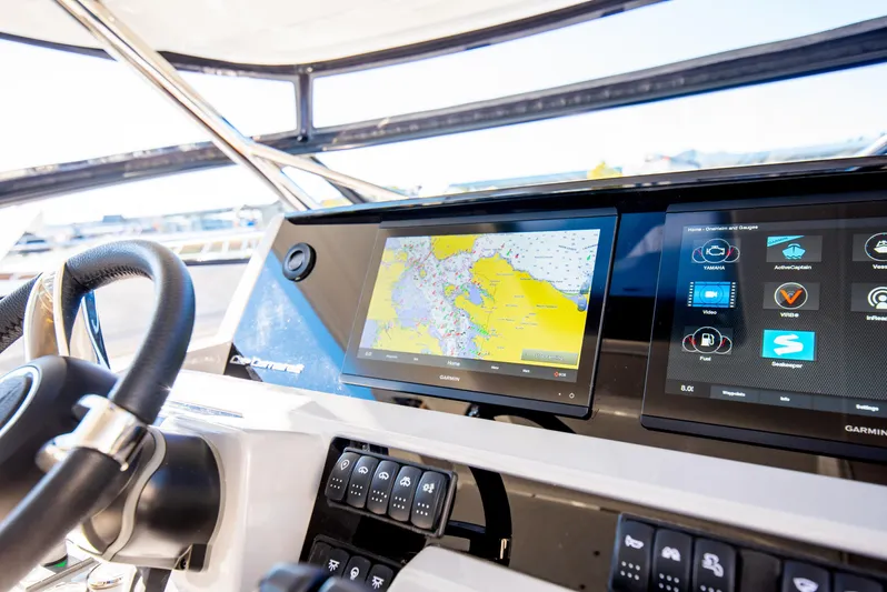 Nauti Brigi Gull Yacht Photos Pics Jeanneau Leader 12.5 WA 2021 dashboard with navigation and control screens.