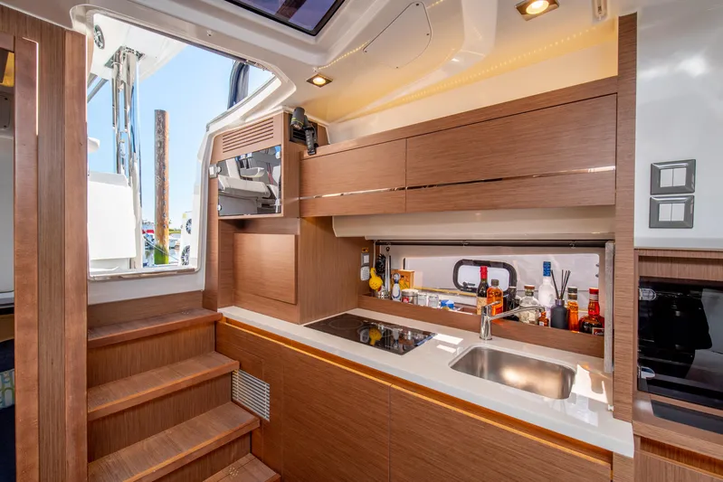 Nauti Brigi Gull Yacht Photos Pics Modern kitchen interior of 2021 Jeanneau Leader 12.5 WA yacht.