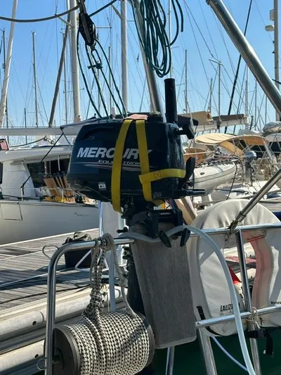 Nemesis Yacht Photos Pics Mercury outboard motor on 2005 Beneteau Oceanis 473 sailboat, docked at marina.