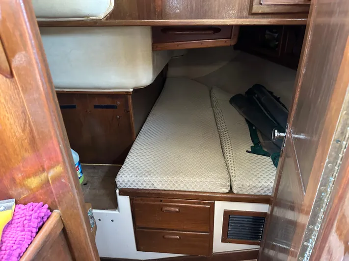 Lagniappe Yacht Photos Pics Interior cabin of 1990 Pacific Seacraft Crealock 44 sailboat with wooden furnishings.