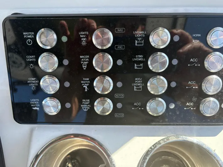  Yacht Photos Pics Control panel of 2023 Caymas 28 HB boat with various switches and dials.