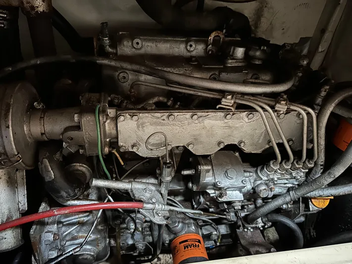 Lagniappe Yacht Photos Pics Engine of 1990 Pacific Seacraft Crealock 44 sailboat, showcasing mechanical components and wiring.