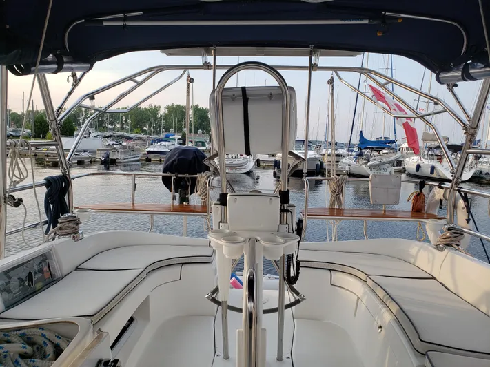 Inspiration VI Yacht Photos Pics Interior view of a 2006 Hunter 41 sailboat docked at a marina.