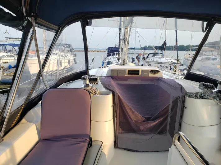 Inspiration VI Yacht Photos Pics Interior view of a 2006 Hunter 41 sailboat docked at a marina.