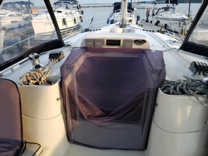 Inspiration VI Yacht Photos Pics Cockpit view of a 2006 Hunter 41 sailboat docked at a marina.