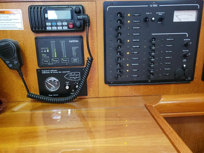Inspiration VI Yacht Photos Pics Electrical control panel on a 2006 Hunter 41 sailboat with radio and gauges.