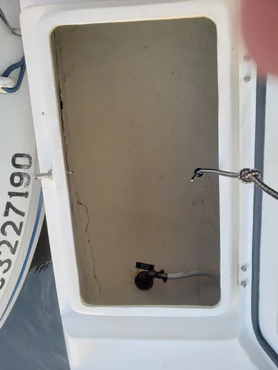 Inspiration VI Yacht Photos Pics Open storage compartment on a 2006 Hunter 41 boat.