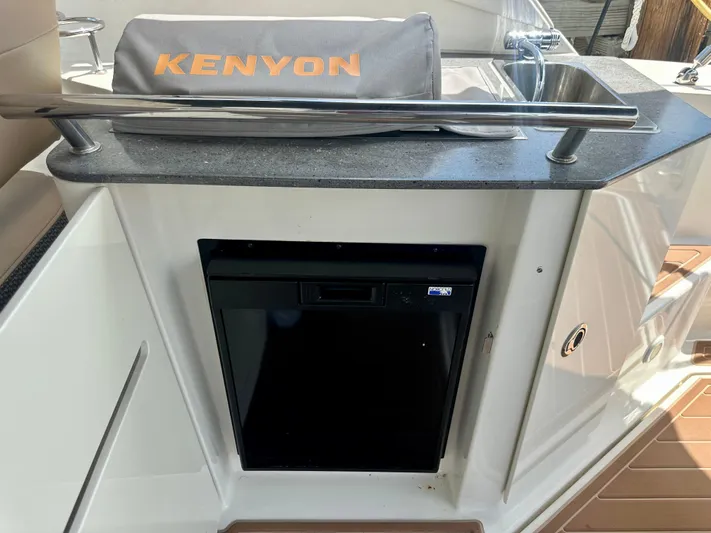  Yacht Photos Pics 2012 Sea Ray 310 Sundancer kitchenette with Kenyon grill and compact fridge.