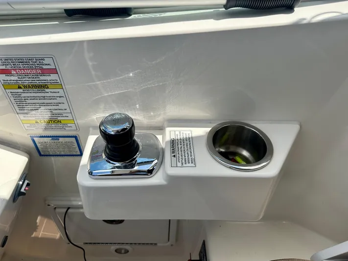  Yacht Photos Pics Control panel and cup holder on 2012 Sea Ray 310 Sundancer boat.