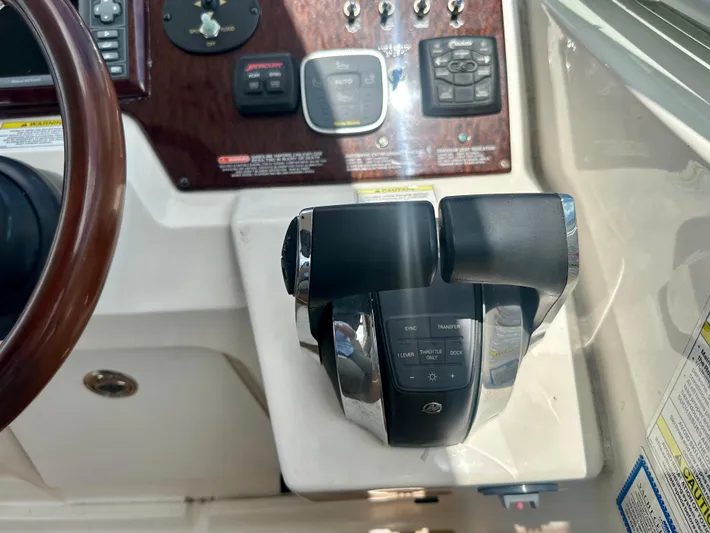  Yacht Photos Pics 2012 Sea Ray 310 Sundancer helm controls and dashboard close-up.