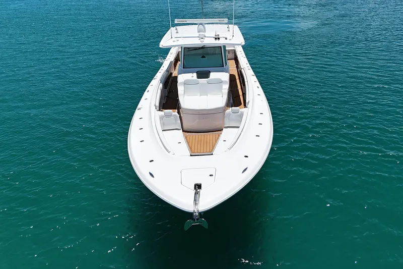  Yacht Photos Pics 2020 HCB 53 Sueños boat on clear blue water, aerial view.
