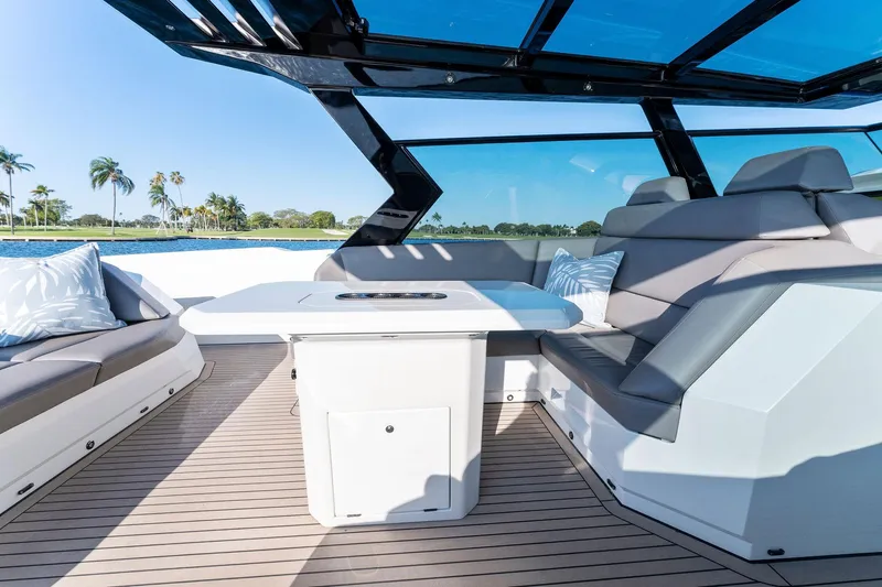 The Next Trade Yacht Photos Pics Luxurious 2022 Vanquish Yachts VQ58 interior with sleek seating and modern design.