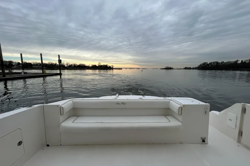  Yacht Photos Pics 2008 Sea Ray 52 Sedan Bridge yacht at sunset, serene water view.