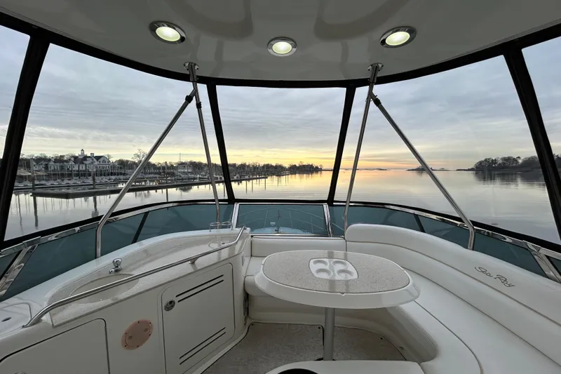  Yacht Photos Pics 2008 Sea Ray 52 Sedan Bridge interior with serene waterfront view at sunset.