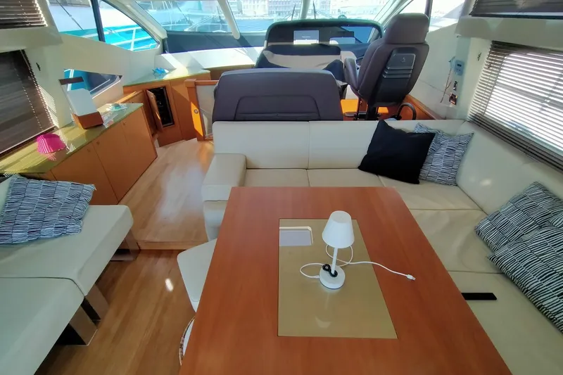  Yacht Photos Pics Luxurious interior of 2009 Sunseeker Predator 64 yacht with modern seating and decor.