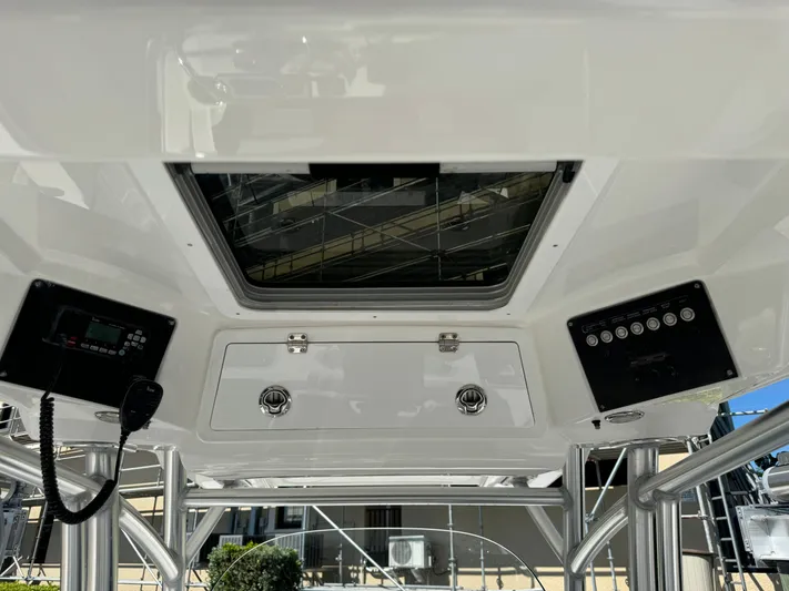  Yacht Photos Pics 2020 Sea Fox 288 Commander boat console with controls and overhead hatch.