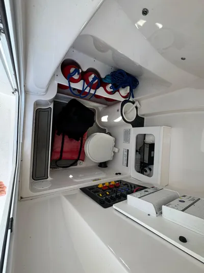  Yacht Photos Pics 2020 Sea Fox 288 Commander interior with storage, ropes, and control panel.