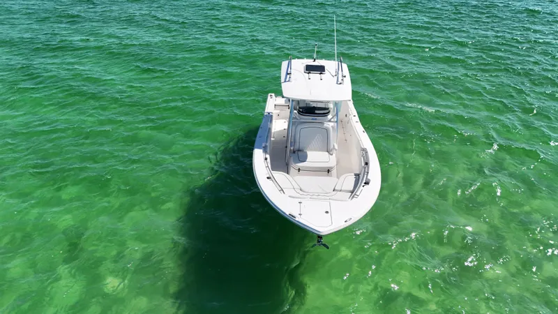 Yacht Photos Pics 2020 Sea Fox 288 Commander boat on clear green water, aerial view.