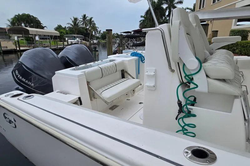  Yacht Photos Pics 2020 Sea Fox 288 Commander boat with Yamaha engines docked in a marina.