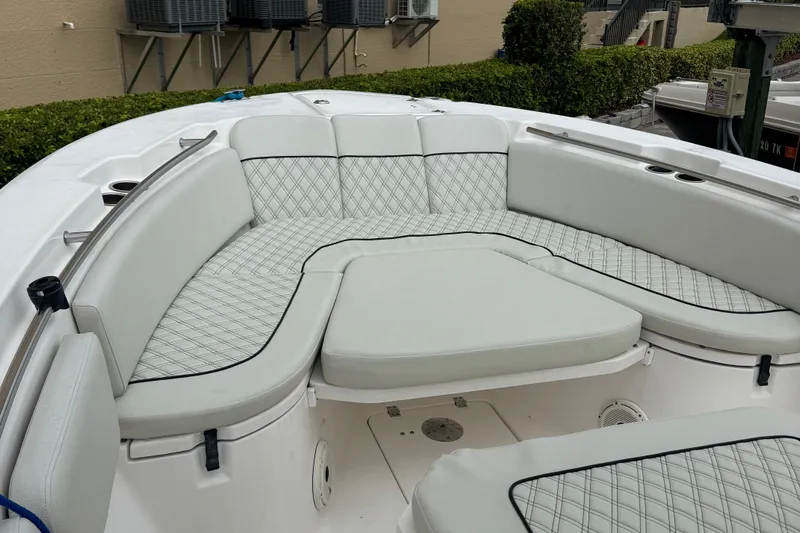  Yacht Photos Pics 2020 Sea Fox 288 Commander boat with cushioned seating and diamond-pattern upholstery.