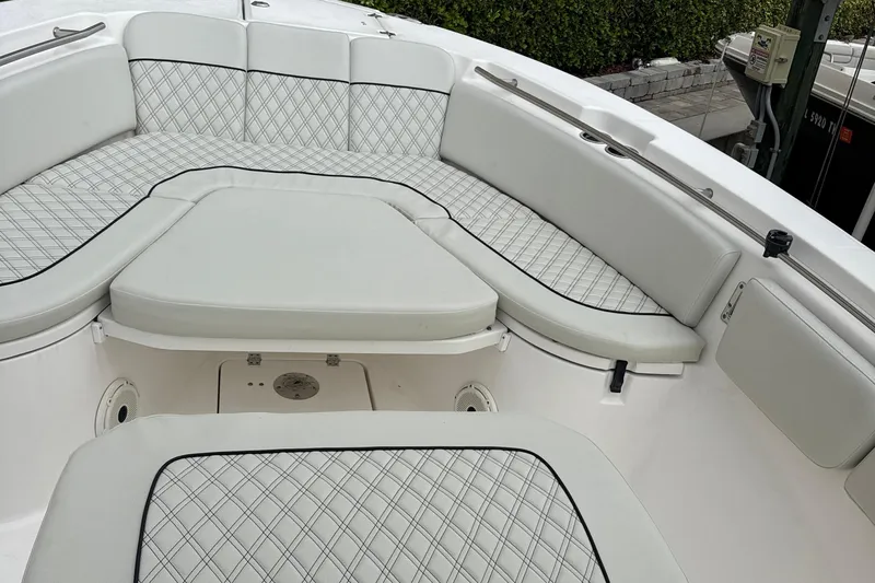  Yacht Photos Pics 2020 Sea Fox 288 Commander boat interior with cushioned seating and diamond-pattern upholstery.