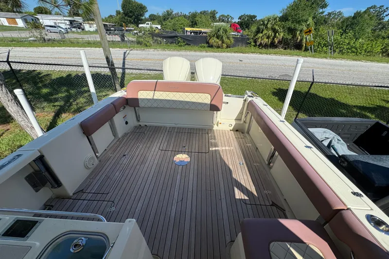  Yacht Photos Pics 2018 Chris-Craft Calypso 30 boat interior with spacious deck and seating.