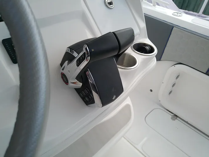  Yacht Photos Pics 2025 Glasstream 328 SCX boat interior with steering wheel and control panel.