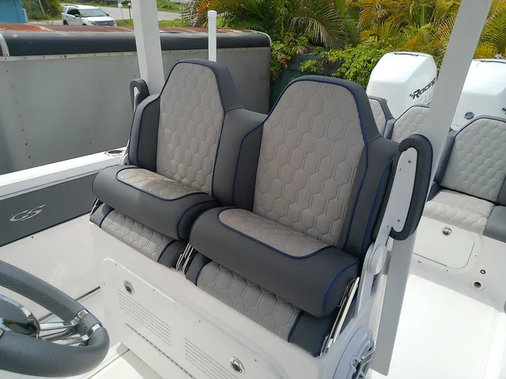 Yacht Photos Pics 2025 Glasstream 328 SCX boat seats with hexagonal pattern and sleek design.