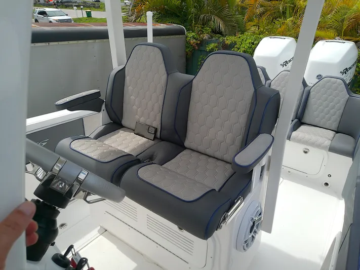  Yacht Photos Pics 2025 Glasstream 328 SCX boat interior with luxurious seating and modern design.