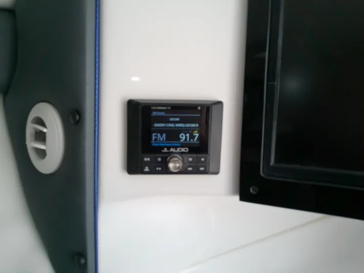  Yacht Photos Pics JL Audio system on 2025 Glasstream 328 SCX boat dashboard.
