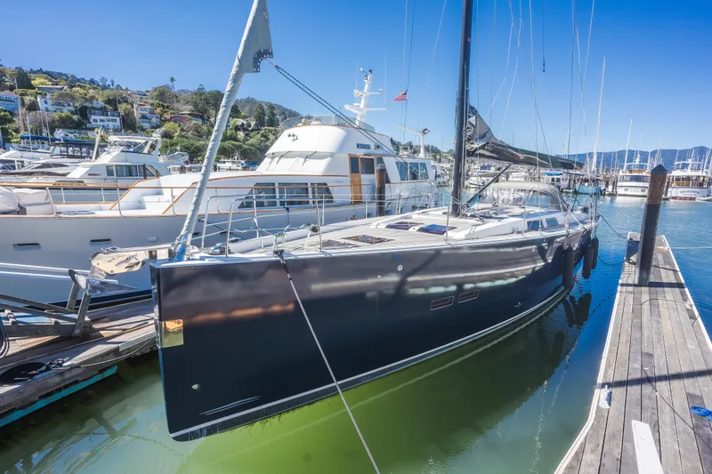 Vie Le Reve Yacht Photos Pics 2013 Hanse 575 yacht docked in a sunny marina.