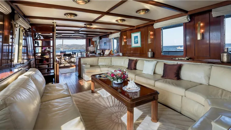 Le Kir Royal Yacht Photos Pics Luxurious interior of 1966 Van den Akker Le Kir Royal yacht with elegant seating and decor.