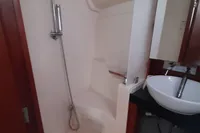 Bathroom interior of 2017 Hanse 455 yacht with shower and sink.