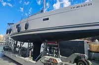 2017 Hanse 455 sailboat on trailer, dockside with blue sky background.